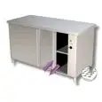 Mesa de trabajo central pasante Inox con armario caliente y puertas correderas - con peto posterior - Encimera de 4 cm de espesor - Potencia W 2500 - Alimentación monofásica 230V/1/50hz
